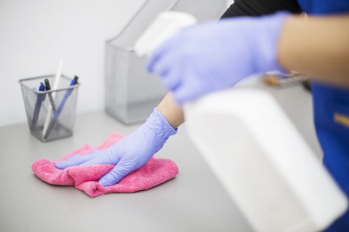 Professional office cleaners working in a Hammersmith workplace