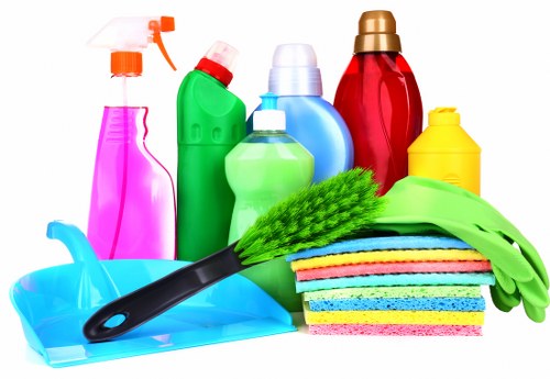 Professional carpet cleaner treating stains in a local Hammersmith property