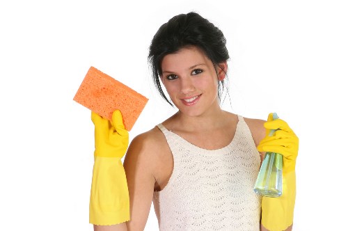 Technician preparing safe oven cleaning equipment in Hammersmith kitchen