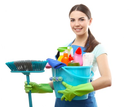 Local cleaner tidying a family kitchen in Hammersmith